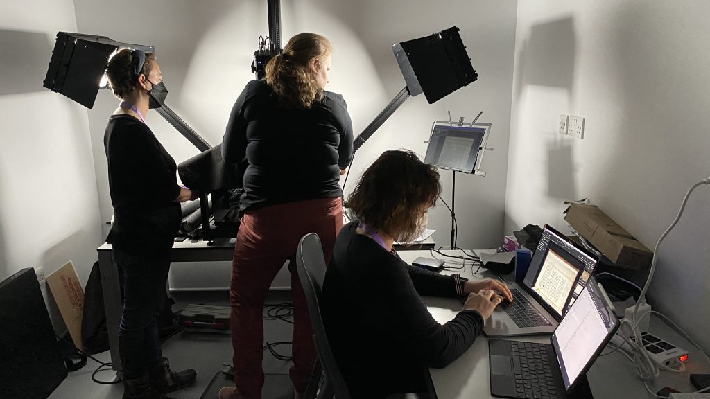 Image of three volunteers digitizing in London.